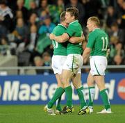 2 October 2011; Ireland's Brian O'Driscoll is congratulated by team-mate Ronan O'Gara after scoring their side's first try. 2011 Rugby World Cup, Pool C, Ireland v Italy, Otago Stadium, Dunedin, New Zealand. Picture credit: Brendan Moran / SPORTSFILE