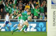 2 October 2011; Ireland's Brian O'Driscoll on his way to scoring his side's first try. 2011 Rugby World Cup, Pool C, Ireland v Italy, Otago Stadium, Dunedin, New Zealand. Picture credit: Brendan Moran / SPORTSFILE