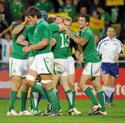 2 October 2011; Ireland's Brian O'Driscoll, 13, is congratulated by his team-mates after scoring their side's first try. 2011 Rugby World Cup, Pool C, Ireland v Italy, Otago Stadium, Dunedin, New Zealand. Picture credit: Brendan Moran / SPORTSFILE