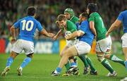 2 October 2011; Gordon D'Arcy, Ireland, is tackled by Salvatore Perugini, Italy. 2011 Rugby World Cup, Pool C, Ireland v Italy, Otago Stadium, Dunedin, New Zealand. Picture credit: Brendan Moran / SPORTSFILE
