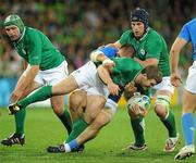 2 October 2011; Gordon D'Arcy, Ireland, is tackled by Salvatore Perugini, Italy. 2011 Rugby World Cup, Pool C, Ireland v Italy, Otago Stadium, Dunedin, New Zealand. Picture credit: Brendan Moran / SPORTSFILE