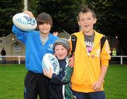 1 October 2011; Leinster supporters Zack Kelly, aged 11, from Glasnevin, left, Aaron McCoy, from Cabinteely, aged 5, centre, and Massey McShane, aged 10, from Glenageary, Dublin, at the game. Celtic League, Leinster v Aironi, RDS, Ballsbridge, Dublin. Picture credit: Diarmuid Greene / SPORTSFILE