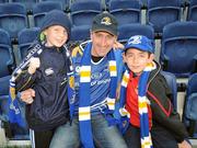 1 October 2011; Leinster supporters Mark Lynch, aged 9, Kevin Sweeney, centre, and Mark Sweeney, aged 10, right, all from Balbriggan, Dublin, at the game. Celtic League, Leinster v Aironi, RDS, Ballsbridge, Dublin. Picture credit: Diarmuid Greene / SPORTSFILE