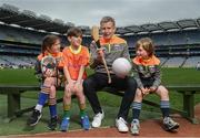 12 April 2017; Comedian, TV host and 1987 All-Ireland winner for Down, Patrick Kielty was joined by a host of GAA All-Stars at Croke Park today to launch Kellogg’s GAA Cúl Camps 2017. Kellogg’s is on a mission for the promotion of nutrition to fuel active play. Last year, 127,000 children took part in Ireland’s largest summer camps enjoying a week of fun, GAA coaching, nutrition education and a free kit. kelloggsculcamps.gaa.ie for information and registration. At the launch in Croke Park, Dublin, is Comedian, TV host and 1987 All-Ireland winner for Down, Patrick Kielty with, from left, Lilyanna Healy, age 9, Tom Healy, age 11, and Oliver Healy, age 8, all from Rathmines, Dublin. Photo by Stephen McCarthy/Sportsfile