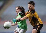 12 April 2017; Caoimhe Cullen, representing St. Brigids GAA Club, Co Roscommon, in action against Ethan Carden, representing Enniscrone Kilglass GAA, Co Sligo, during The Go Games Provincial Days in partnership with Littlewoods Ireland Day 3 at Croke Park in Dublin. Photo by Cody Glenn/Sportsfile