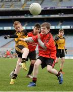 12 April 2017; Darragh Long, representing Enniscrone GAA Club, Co Sligo, takes a shot despite the attempts of Jason Lyons, representing Ballyhaunis GAA Club, Co Mayo, during The Go Games Provincial Days in partnership with Littlewoods Ireland Day 3 at Croke Park in Dublin. Photo by Cody Glenn/Sportsfile