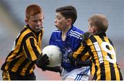 12 April 2017; , Dion Lane, representing St Ronans GAA Club, Co Roscommon, in action against Cormac Conan, left, and Kevin Speakart, representing Parke Keelogues Crimlin GAA Club, Co Mayo, during The Go Games Provincial Days in partnership with Littlewoods Ireland Day 3 at Croke Park in Dublin. Photo by Cody Glenn/Sportsfile