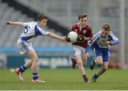 13 April 2017; Aaron Duggan representing Balla GAA Club, Co. Mayo, in action against left, Gareth Barry and right, Bobby Hanrahan representing St Marys Kiltoghert GAA Club, Co. Leitrim, during the Go Games Provincial Days in partnership with Littlewoods Ireland Day 4 at Croke Park in Dublin. Photo by Eóin Noonan/Sportsfile