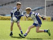 13 April 2017; Ambrose Devine representing St Marys GAA Club, Kiltoghert, Co. Leitrim, in action against Oisin Mulderrig representing Kiltimagh GAA Club, Co. Mayo, during the Go Games Provincial Days in partnership with Littlewoods Ireland Day 4 at Croke Park in Dublin. Photo by Seb Daly/Sportsfile