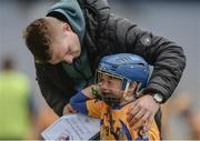 13 April 2017; Joe Canning of Portumna and Galway comforting his nephew Jody Canning representing Portumna GAA Club, Co. Galway, during the Go Games Provincial Days in partnership with Littlewoods Ireland Day 4 at Croke Park in Dublin. Photo by Eóin Noonan/Sportsfile