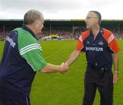 22 July 2006; Cork manager John Allen shakes hands with Limerick manager Richie Bennis, left, after the final whistle. Guinness All-Ireland Senior Hurling Championship Quarter-Final, Cork v Limerick, Semple Stadium, Thurles, Co. Tipperary. Picture credit: Brendan Moran / SPORTSFILE