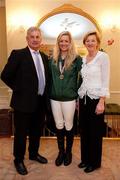 1 October 2011; In attendance at a young rider eventing European Championship team Prize giving ceremony are the Young Family. Young rider Melaine, with her parents John and Linda. Tattersalls House, Ratoath, Co. Meath. Picture credit: Barry Cregg / SPORTSFILE