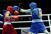 3 October 2011; Paddy Barnes, Holy Family B.C., Belfast, Antrim, representing Ireland, right, exchanges punches with Mark Barriga, Philippines, during their 49kg bout. Barnes was defeated 20-12 by Barriga. 2011 AIBA World Boxing Championships - Last 32, Paddy Barnes v Mark Barriga. Heydar Aliyev Sports and Exhibition Complex, Baku, Azerbaijan. Picture credit: Stephen McCarthy / SPORTSFILE