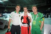 3 October 2011; David Oliver Joyce, St Michael's Athy B.C., Kildare, representing Ireland, following his 26-13 victory over Mohammad Khaiber, Afghanistan, in their 60kg bout with coaches Billy Walsh, left, and Zaur Antia. Joyce advanced to the Last 16 following his victory. 2011 AIBA World Boxing Championships - Last 32, David Oliver Joyce v Mohammad Khaiber. Heydar Aliyev Sports and Exhibition Complex, Baku, Azerbaijan. Picture credit: Stephen McCarthy / SPORTSFILE