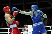 4 October 2011; Joe Ward, Moate B.C., Westmeath, representing Ireland, right, exchanges punches with Ehsan Rouzbahani, Iran, during their 81kg bout. Ward was defeated on countback after the bout ended 15-15. 2011 AIBA World Boxing Championships - Last 16, Joe Ward v Ehsan Rouzbahani. Heydar Aliyev Sports and Exhibition Complex, Baku, Azerbaijan. Picture credit: Stephen McCarthy / SPORTSFILE