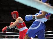 4 October 2011; David Oliver Joyce, St Michael's Athy B.C., Kildare, representing Ireland, left, exchanges punches with Jai Bhagwan, India, during their 60kg bout. Joyce was defeated 32-30. 2011 AIBA World Boxing Championships - Last 16, David Oliver Joyce v Jai Bhagwan. Heydar Aliyev Sports and Exhibition Complex, Baku, Azerbaijan. Picture credit: Stephen McCarthy / SPORTSFILE