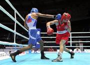 4 October 2011; David Oliver Joyce, St Michael's Athy B.C., Kildare, representing Ireland, right, exchanges punches with Jai Bhagwan, India, during their 60kg bout. Joyce was defeated 32-30. 2011 AIBA World Boxing Championships - Last 16, David Oliver Joyce v Jai Bhagwan. Heydar Aliyev Sports and Exhibition Complex, Baku, Azerbaijan. Picture credit: Stephen McCarthy / SPORTSFILE