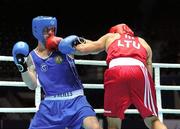 4 October 2011; Roy Sheehan, St Michael's Athy B.C., Kildare, representing Ireland, left, exchanges punches with Egidijus Kavaliauskas, Lithuania, during their 69kg bout. Roy Sheehan was defeated on a score of 11-7. 2011 AIBA World Boxing Championships - Last 16, Roy Sheehan v Egidijus Kavaliauskas. Heydar Aliyev Sports and Exhibition Complex, Baku, Azerbaijan. Picture credit: Stephen McCarthy / SPORTSFILE