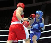 4 October 2011; Con Sheehan, Clonmel B.C., Tipperary, representing Ireland, right, exchanges punches with Roberto Cammerelle, Italy, during their 91+kg bout. Sheehan retired during the third round after visiting the medic twice. 2011 AIBA World Boxing Championships - Last 16, Con Sheehan v Roberto Cammerelle. Heydar Aliyev Sports and Exhibition Complex, Baku, Azerbaijan. Picture credit: Stephen McCarthy / SPORTSFILE