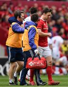 15 April 2017; Darren Sweetnam of Munster is assisted from the pitch for a HIA during the Guinness PRO12 match between Munster and Ulster at Thomond Park in Limerick. Photo by Ramsey Cardy/Sportsfile