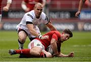 15 April 2017; Ian Keatley of Munster is tackled by Ruan Pienaar of Ulster during the Guinness PRO12 Round 20 match between Munster and Ulster at Thomond Park in Limerick. Photo by Diarmuid Greene/Sportsfile