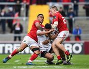15 April 2017; Charles Piutau of Ulster is tackled by Francis Saili, left, and Andrew Conway of Munster during the Guinness PRO12 match between Munster and Ulster at Thomond Park in Limerick. Photo by Ramsey Cardy/Sportsfile