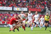 15 April 2017; Andrew Trimble of Ulster is tackled by Keith Earls, left, and Donnacha Ryan of Munster during the Guinness PRO12 match between Munster and Ulster at Thomond Park in Limerick. Photo by Ramsey Cardy/Sportsfile