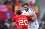 15 April 2017; Stuart McCloskey of Ulster is tackled by Jean Deysel of Munster during the Guinness PRO12 match between Munster and Ulster at Thomond Park in Limerick. Photo by Ramsey Cardy/Sportsfile
