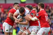 15 April 2017; Iain Henderson of Ulster is tackled by, from left, Francis Saili, Dave O’Callaghan and Rhys Marshall of Munster during the Guinness PRO12 match between Munster and Ulster at Thomond Park in Limerick. Photo by Ramsey Cardy/Sportsfile
