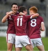 15 April 2017; Galway players, from left, Eóin Finnerty, Micheál Daly, and Peter Cooke celebrate after the EirGrid GAA Football All-Ireland U21 Championship Semi-Final match between Galway and Kerry at Cusack Park in Ennis, Co Clare. Photo by Ray McManus/Sportsfile