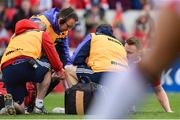 15 April 2017; Rory Scannell of Munster is treated for an injury during the Guinness PRO12 match between Munster and Ulster at Thomond Park in Limerick. Photo by Ramsey Cardy/Sportsfile