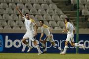7 October 2006; Michael Constantinou, Cyprus, celebrates with team-mates Konstantinos Charalampidis, and Efstathios Alongftis, right, after scoring his penalty. Euro 2008 Championship Qualifier, Cyprus v Republic of Ireland, GSP Stadium, Nicosia, Cyprus. Picture credit: Brian Lawless / SPORTSFILE