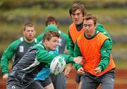 5 October 2011; Ireland scrum-half Eoin Reddan is tackled by Brian O'Driscoll during squad training ahead of their 2011 Rugby World Cup Quarter-Final against Wales on Saturday. Ireland Rugby Squad Training, Rugby League Park, Wellington, New Zealand. Picture credit: Brendan Moran / SPORTSFILE