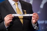 6 October 2011; Chairman of the Leinster Council Martin Skelly pulls out the name of Kildare while making the draw for the Leinster Senior Football Championship during the draws for the 2012 GAA All-Ireland Senior Championship, Croke Park, Dublin. Picture credit: Barry Cregg / SPORTSFILE