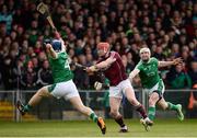 16 April 2017; Conor Whelan of Galway shoots towards goal despite the efforts of Mike Casey, left, and Seamus Hickey of Limerick during the Allianz Hurling League Division 1 Semi-Final match between Limerick and Galway at the Gaelic Grounds in Limerick. Photo by Diarmuid Greene/Sportsfile