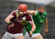 16 April 2017; The sliothar is the centre of focus as Conor Whelan of Galway is tackled by Mike Casey of Limerick during the Allianz Hurling League Division 1 Semi-Final match between Limerick and Galway at the Gaelic Grounds in Limerick. Photo by Ray McManus/Sportsfile