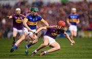 16 April 2017; Paul Morris of Wexford in action against Cathal Barrett of Tipperary during the Allianz Hurling League Division 1 Semi-Final match between Wexford and Tipperary at Nowlan Park in Kilkenny. Photo by Stephen McCarthy/Sportsfile