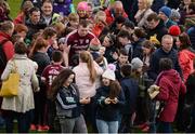 16 April 2017; Aisling Magner, from Ashford, left, and Niamh Mullins, from Ardagh, Co. Limerick react after each taking a selfie with Joe Canning of Galway after the Allianz Hurling League Division 1 Semi-Final match between Limerick and Galway at the Gaelic Grounds in Limerick. Photo by Diarmuid Greene/Sportsfile