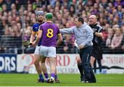 16 April 2017; Wexford manager Davy Fitzgerald tussles with Jason Forde of Tipperary during the Allianz Hurling League Division 1 Semi-Final match between Wexford and Tipperary at Nowlan Park in Kilkenny. Photo by Ramsey Cardy/Sportsfile