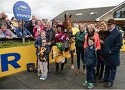 16 April 2017; Jockey Bryan Cooper and Road To Respect with the winning connections including owner Michael O'Leary following the Ryanair Gold Cup Novice Steeplechase during the Fairyhouse Easter Festival at Fairyhouse Racecourse in Ratoath, Co Meath. Photo by Seb Daly/Sportsfile