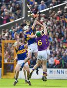 16 April 2017; Seamus Kennedy of Tipperary in action against Matthew O'Hanlon, left, and Jack O'Connor of Wexford during the Allianz Hurling League Division 1 Semi-Final match between Wexford and Tipperary at Nowlan Park in Kilkenny. Photo by Ramsey Cardy/Sportsfile