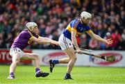 16 April 2017; Michael Cahill of Tipperary in action against David Dunne of Wexford during the Allianz Hurling League Division 1 Semi-Final match between Wexford and Tipperary at Nowlan Park in Kilkenny. Photo by Ramsey Cardy/Sportsfile