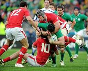 8 October 2011; Sean O'Brien, Ireland, is tackled by Danny Lydiate and Rhys Priestland, Wales. Ireland v Wales, 2011 Rugby World Cup, Quarter-Final, Wellington Regional Stadium, Wellington, New Zealand. Picture credit: Brendan Moran / SPORTSFILE