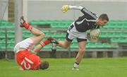 9 October 2011; Kevin Meehan, Clara, gets away from Keith McGuinness, Edenderry. Tullamore Court Hotel Senior Football Final, Clara v Edenderry, O'Connor Park, Tullamore, Co. Offaly. Picture credit: Diarmuid Greene / SPORTSFILE