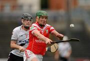 9 October 2011; Joseph Scullion, Loughgiel Shamrocks, in action against Conal McCloskey, Dungiven Kevin Lynchs. AIB GAA Hurling Ulster Senior Club Championship Semi-Final, Loughgiel v  Dungiven Kevin Lynchs, Casement Park, Belfast, Co. Antrim. Picture credit: Oliver McVeigh / SPORTSFILE