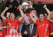 9 October 2011; Edenderry captain Richie Dalton, left, and Derek Kelly, right, lift the cup after victory over Clara. Tullamore Court Hotel Senior Football Final, Clara v Edenderry, O'Connor Park, Tullamore, Co. Offaly. Picture credit: Diarmuid Greene / SPORTSFILE