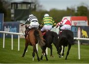 17 April 2017; Project Bluebook, centre, with Barry Geraghty up, race ahead of Dandy Mag, right, with Paul Townend up, who finished second, and Ex Patriot, left, with Rachael Blackmore up, who finished third, on their way to winning the Avoca Dunboyne Juvenile Hurdle during the Fairyhouse Easter Festival at Fairyhouse Racecourse in Ratoath, Co Meath. Photo by Cody Glenn/Sportsfile