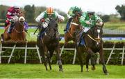 17 April 2017; Shower Silver, far right, with Sean Flanagan up, races ahead of Black Zero, with Mark Enright up, who finished second, on their way to winning the Fairyhouse Steel Handicap Hurdle, during the Fairyhouse Easter Festival at Fairyhouse Racecourse in Ratoath, Co Meath. Photo by Cody Glenn/Sportsfile