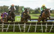 17 April 2017; Shower Silver, centre, with Sean Flanagan up, jump the last ahead of Black Zero,  left, with Mark Enright up, who finished second, and Lasoscar, with Rachael Blackmore up, who finished third, on their way to winning the Fairyhouse Steel Handicap Hurdle, during the Fairyhouse Easter Festival at Fairyhouse Racecourse in Ratoath, Co Meath. Photo by Cody Glenn/Sportsfile