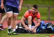 17 April 2017; Conor Murray of Munster ties his boot laces before squad training at the University of Limerick in Limerick. Photo by Diarmuid Greene/Sportsfile